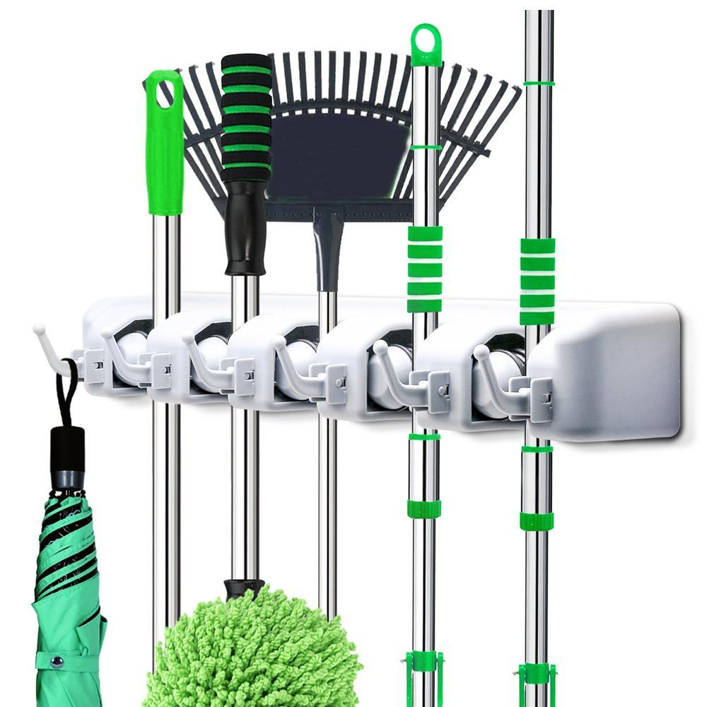5-layer wall-mounted organizer for mops and brooms. 5-layer wall-mounted organizer for mops and brooms.